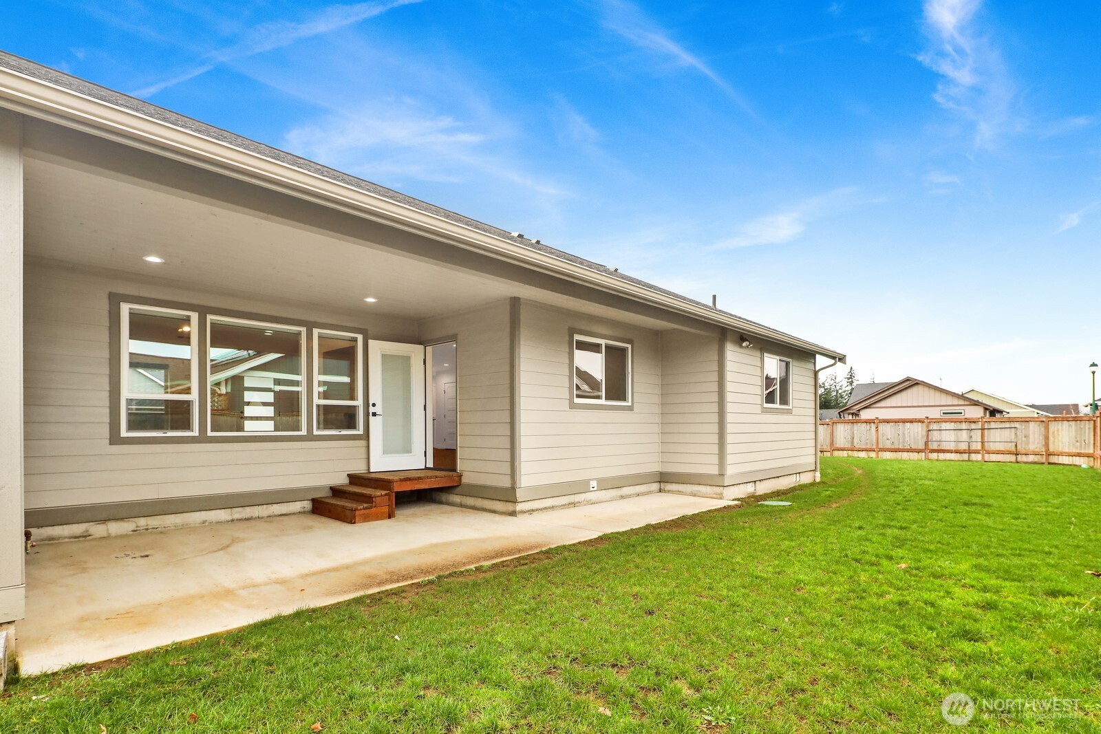 1302 Night Hawk Way Everson, WA 98247 - Photo 31 of 35 a front view of a house with a garden