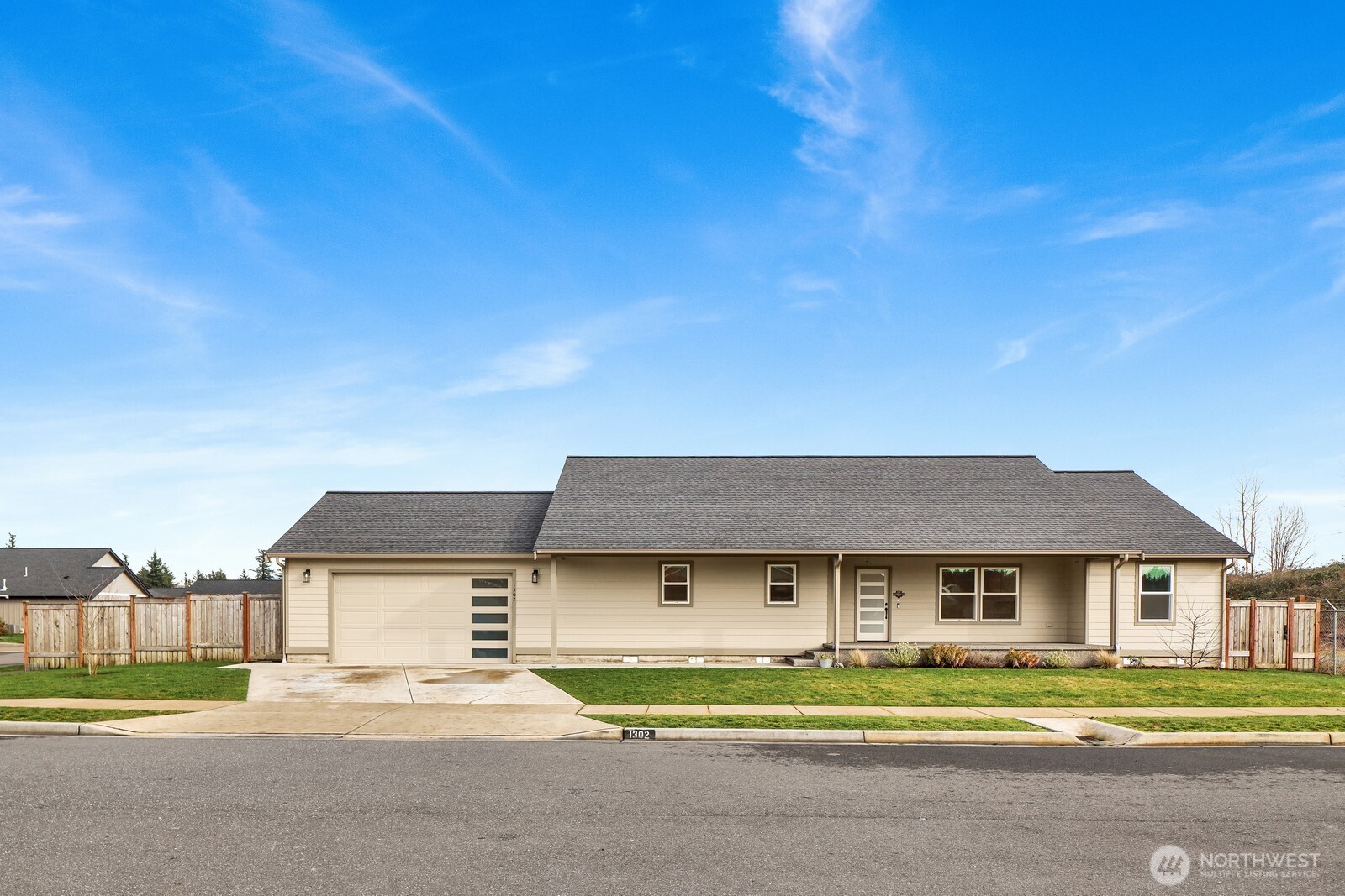 1302 Night Hawk Way Everson, WA 98247 - Photo 35 of 35 a front view of a house with a yard