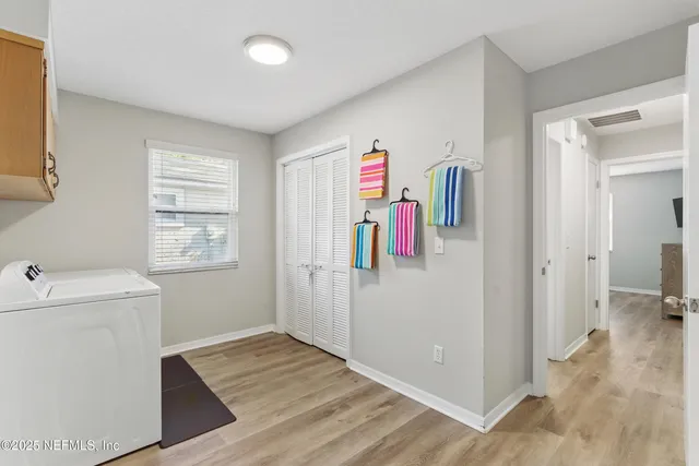 a kitchen with stainless steel appliances granite countertop a stove sink and cabinets