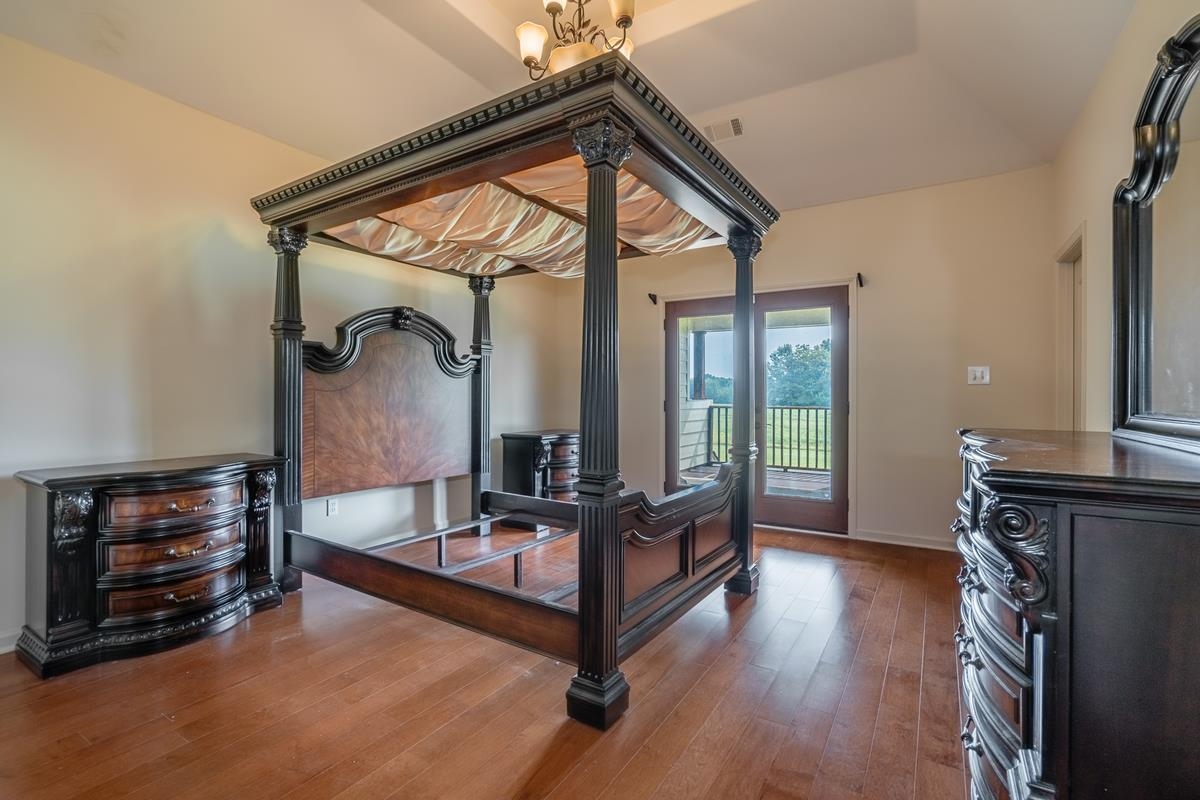 8250 Deadfall Road Millington, TN 38053 - Photo 24 of 26 a very nice looking room with a large window and a flat screen tv