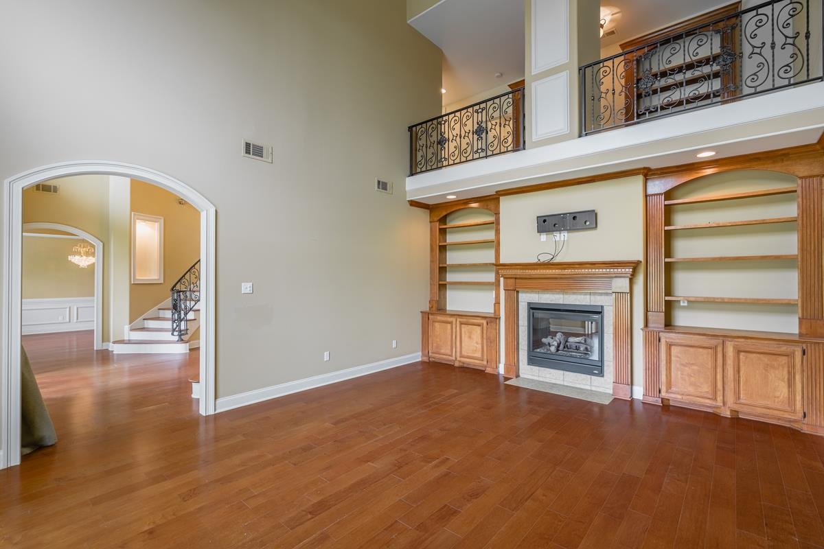 8250 Deadfall Road Millington, TN 38053 - Photo 9 of 26 an entryway view with wooden floor and fireplace