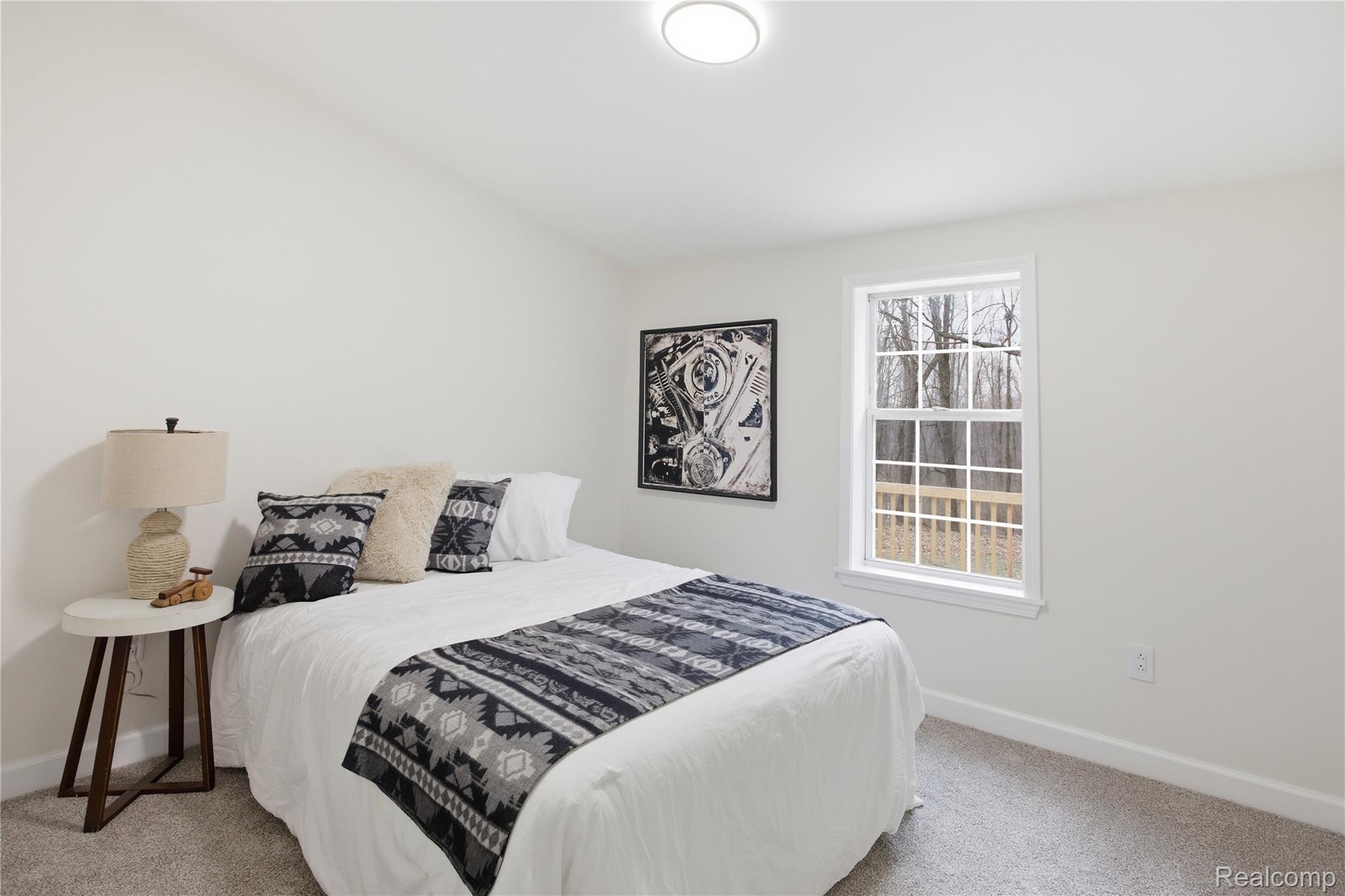 5350 List Road Grass Lake, MI 49240 - Photo 30 of 71 Bedroom with baseboards and light carpet