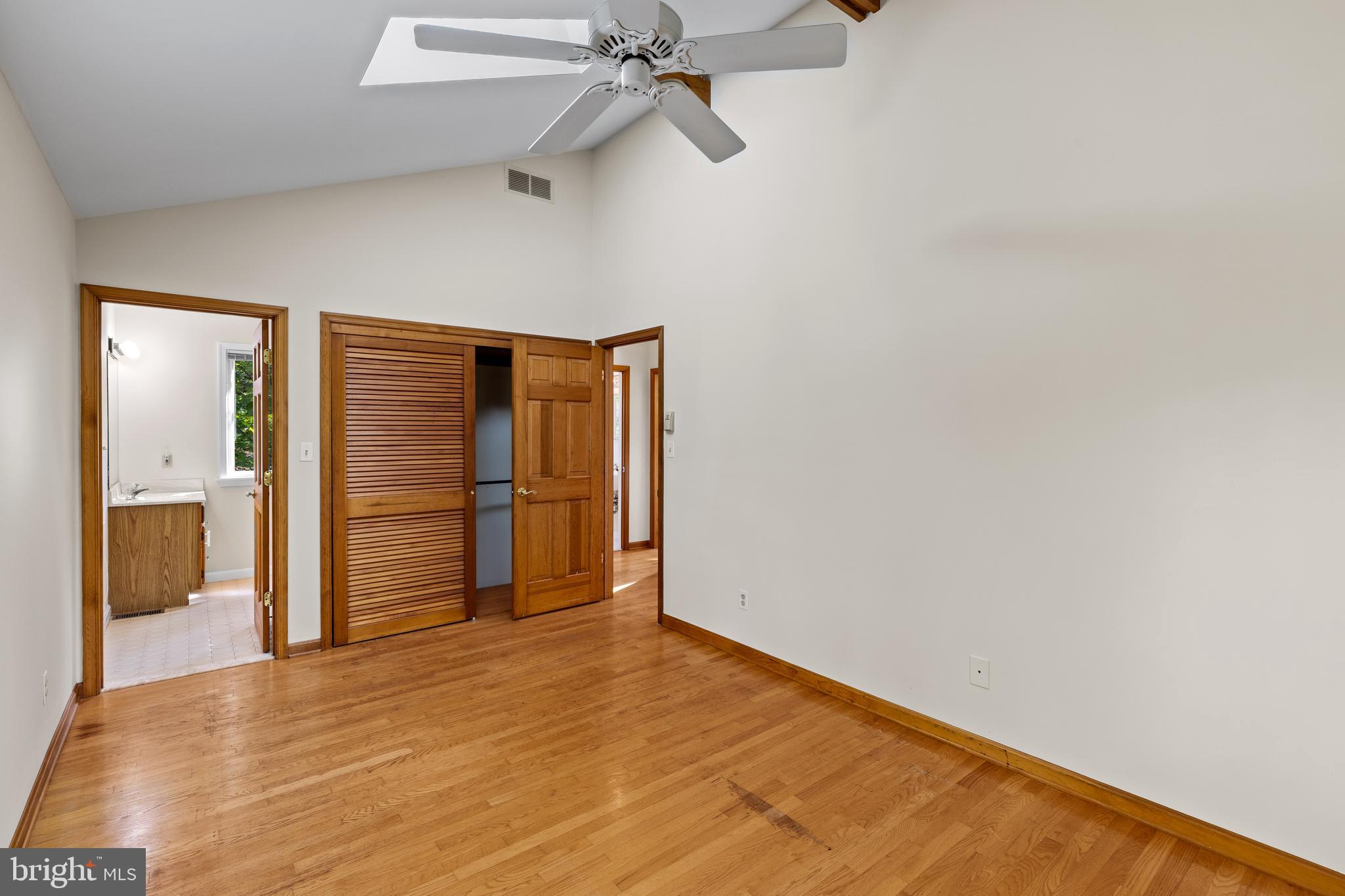 105 Wallace Manor Road Edgewater, MD 21037 - Photo 19 of 35 Primary bedroom with skylights