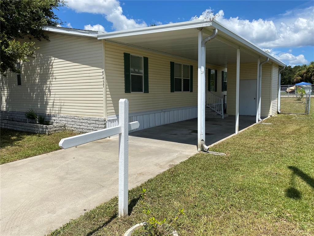 8437 Fantasia Park Way Riverview, FL 33578 - Photo 1 of 1 Covered Carport