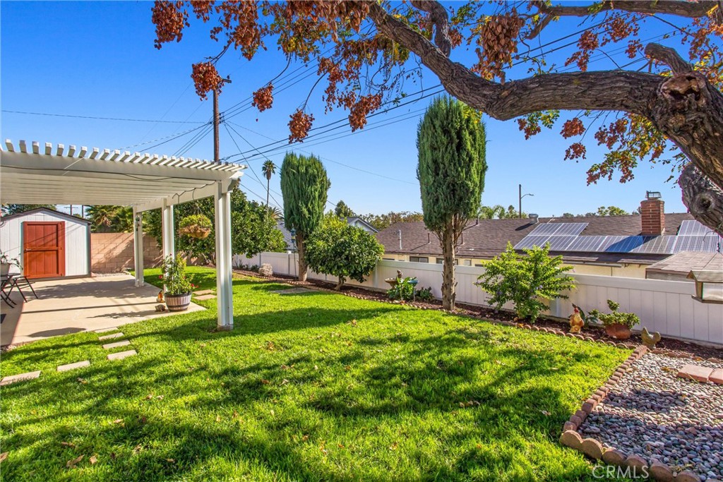 8651 Holly Street Rancho Cucamonga, CA 91701 - Photo 23 of 29 a view of a house with a tree in a yard