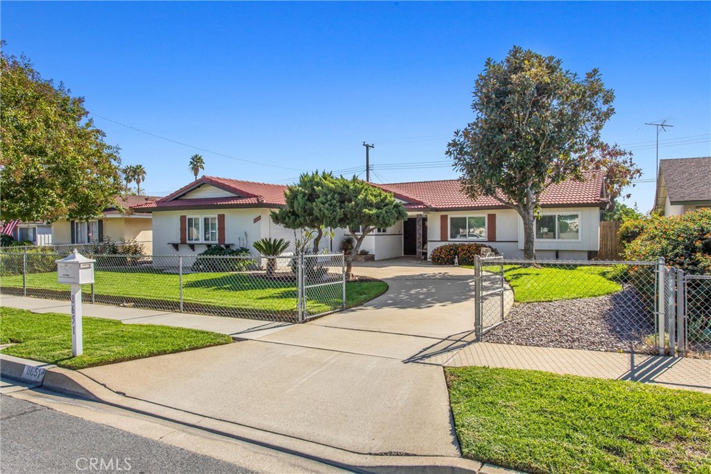 8651 Holly Street Rancho Cucamonga, CA 91701 - Photo 25 of 29 a view of house with outdoor space and swimming pool