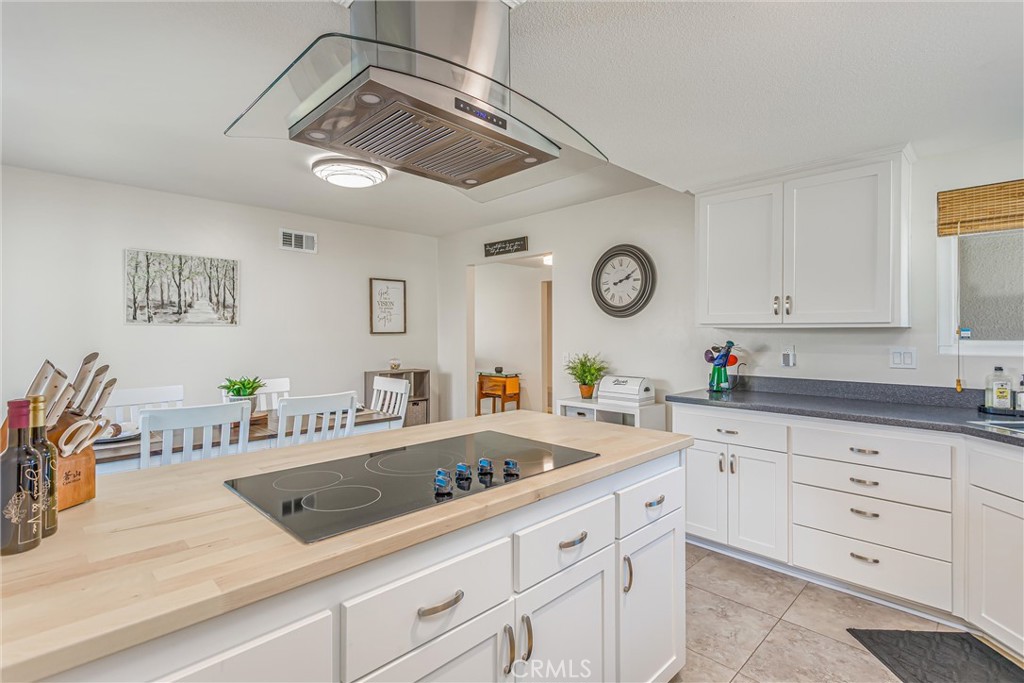 8651 Holly Street Rancho Cucamonga, CA 91701 - Photo 7 of 29 a kitchen with a sink and cabinets