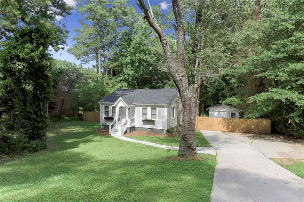 141 Linkwood Road Northwest Atlanta, GA 30311 - Photo 1 of 1 Front of the house.