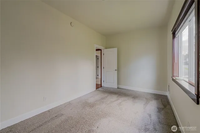 an empty room with window