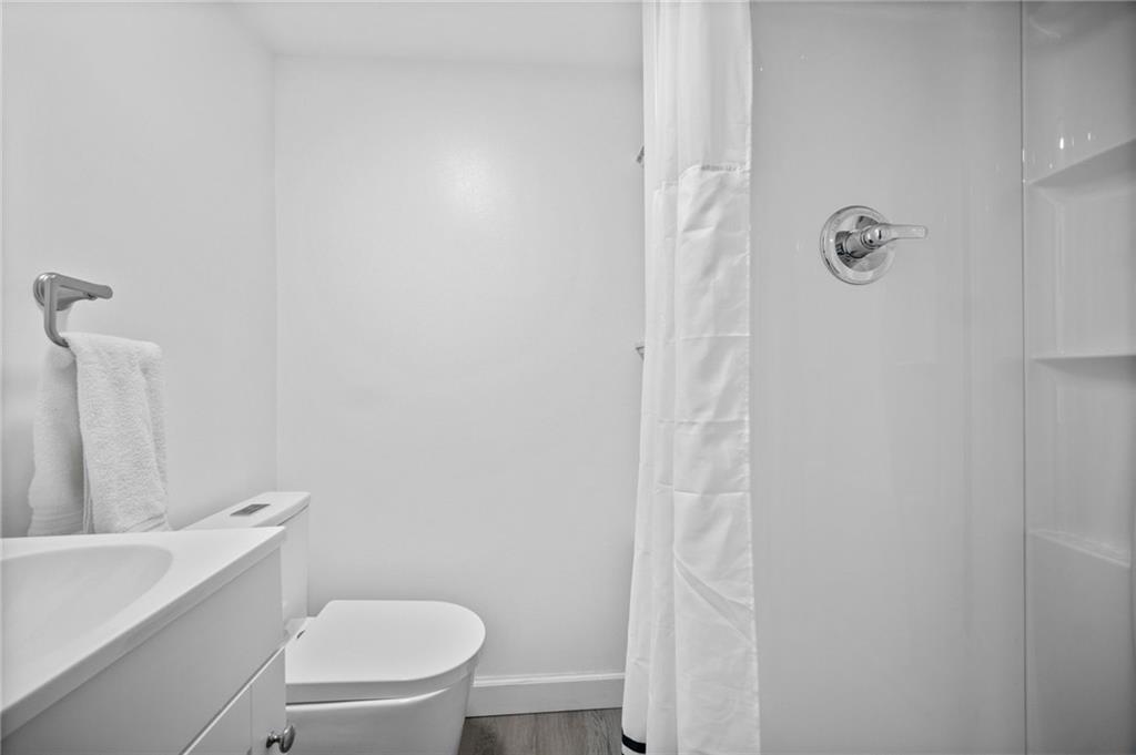 4030 Lebanon Church Road West Mifflin, PA 15122 - Photo 34 of 45 a white toilet sitting next to a white sink
