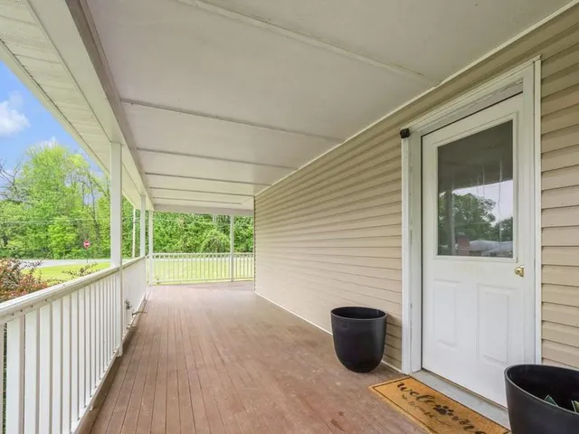 a view of a two chairs in the porch
