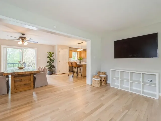 a room with furniture and a flat screen tv
