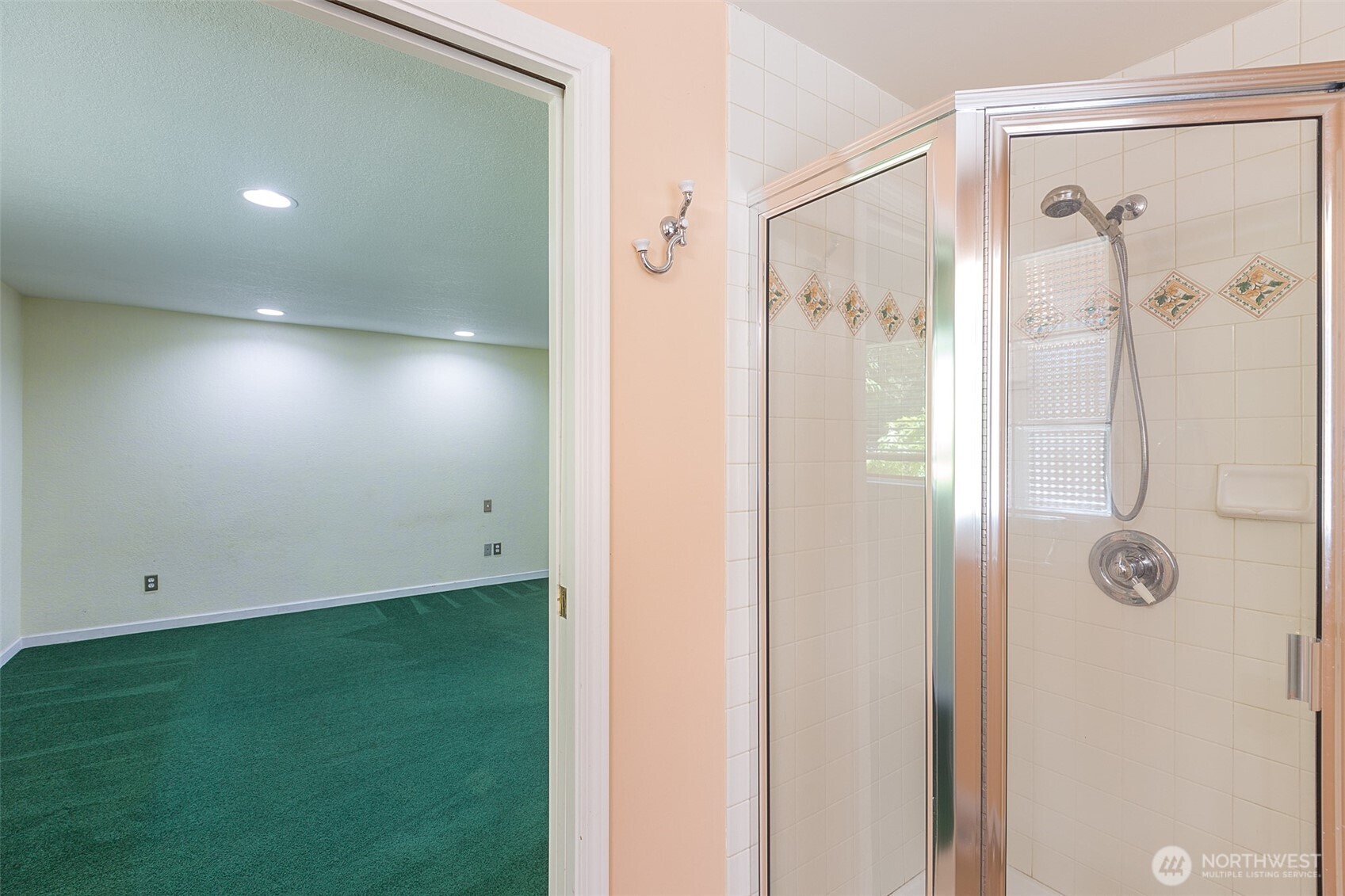 123 Forest Ridge Drive Sequim, WA 98382 - Photo 29 of 32 a bathroom with a shower and a mirror