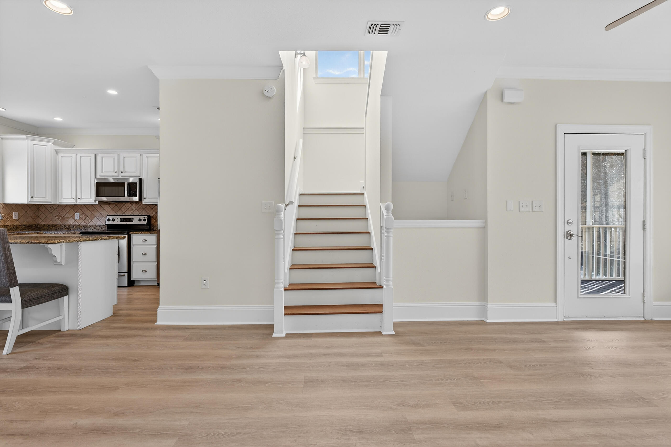 159 7th Street Santa Rosa Beach, FL 32459 - Photo 19 of 53 a view of a kitchen and an empty room