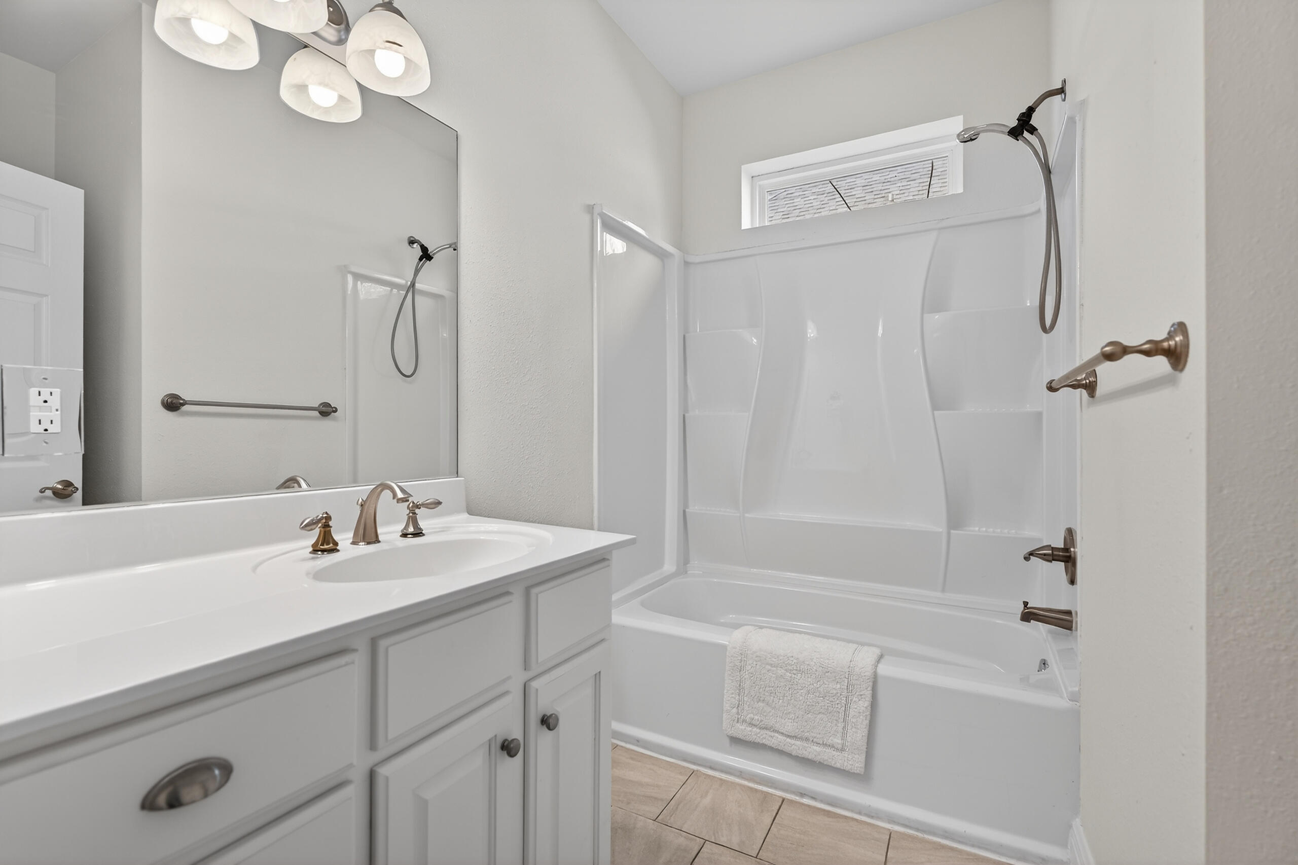 159 7th Street Santa Rosa Beach, FL 32459 - Photo 27 of 53 a bathroom with a sink a toilet and shower