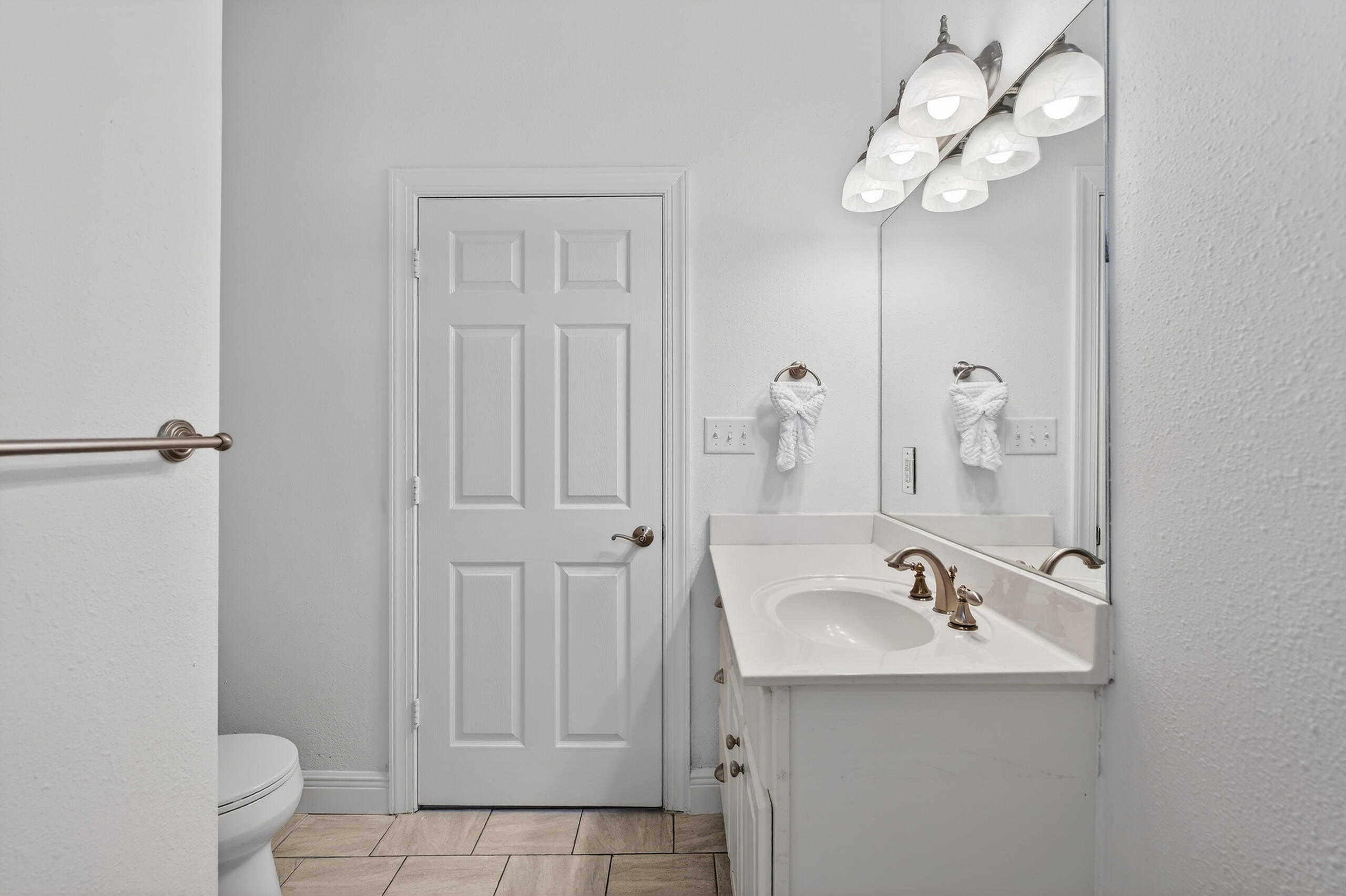 159 7th Street Santa Rosa Beach, FL 32459 - Photo 28 of 53 a bathroom with a sink a toilet and shower