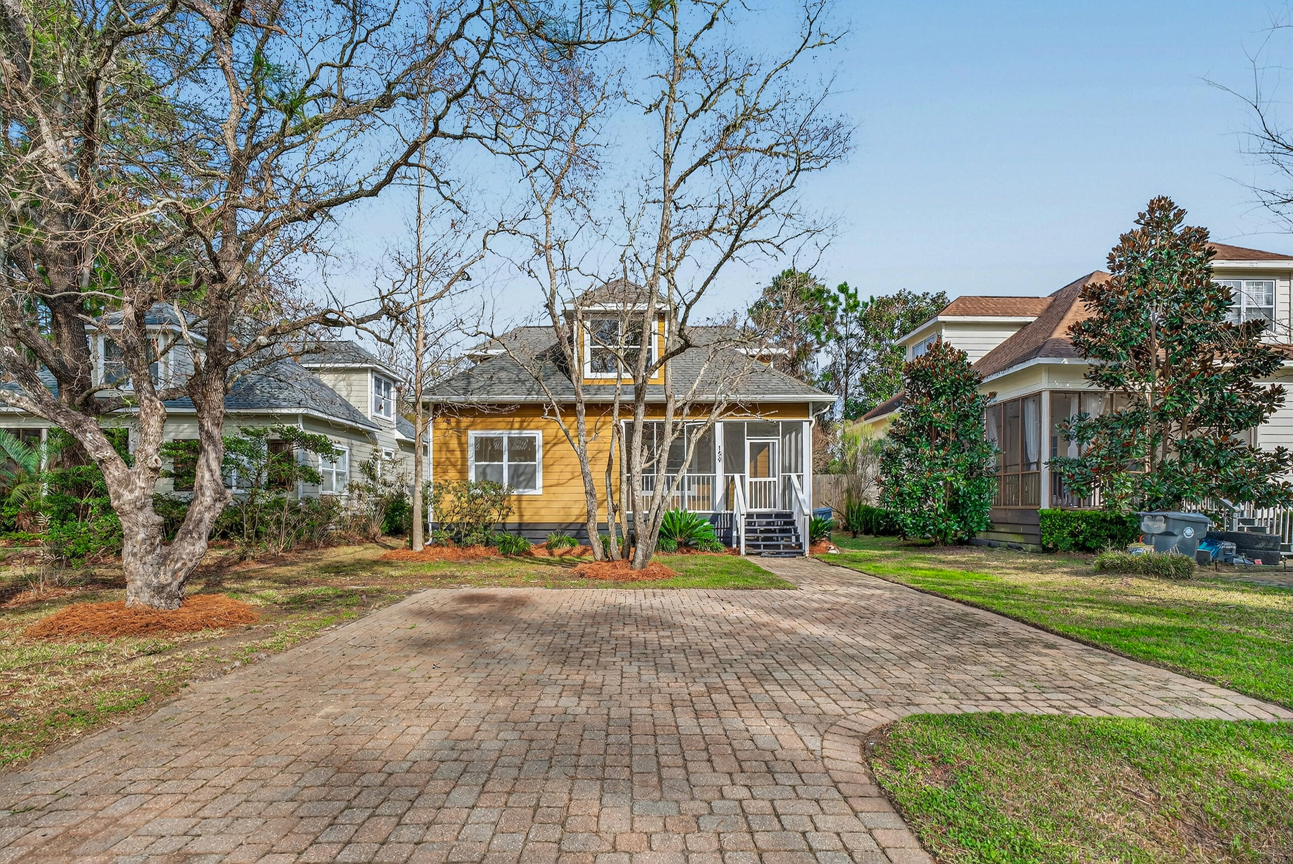 159 7th Street Santa Rosa Beach, FL 32459 - Photo 29 of 53 a front view of a house with a yard