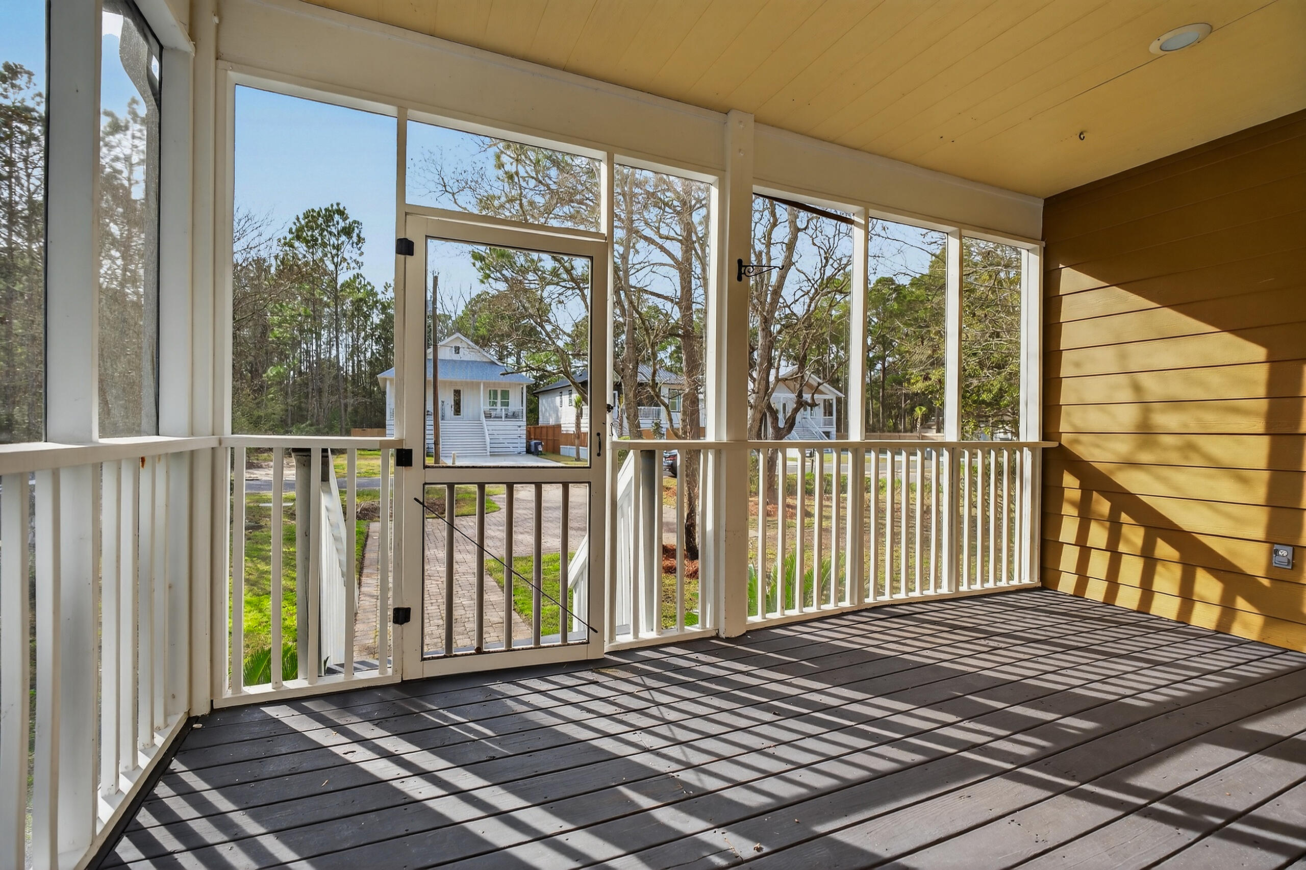 159 7th Street Santa Rosa Beach, FL 32459 - Photo 3 of 53 a view of a balcony with wooden floor