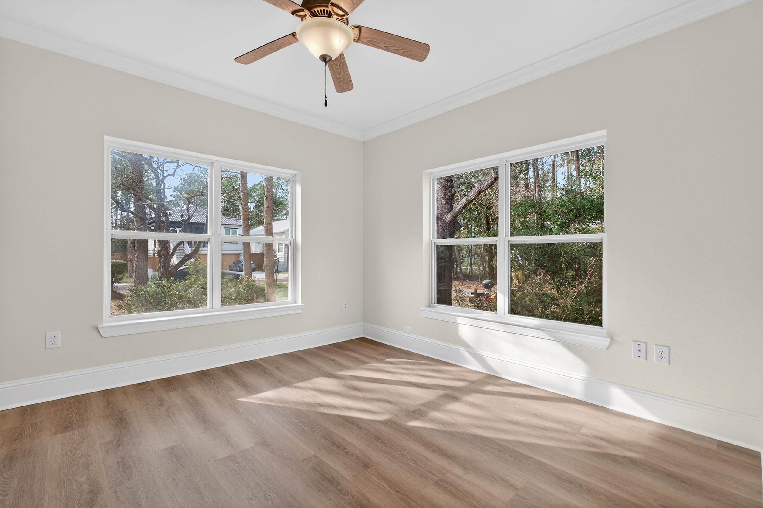 159 7th Street Santa Rosa Beach, FL 32459 - Photo 32 of 53 an empty room with a window and a ceiling fan
