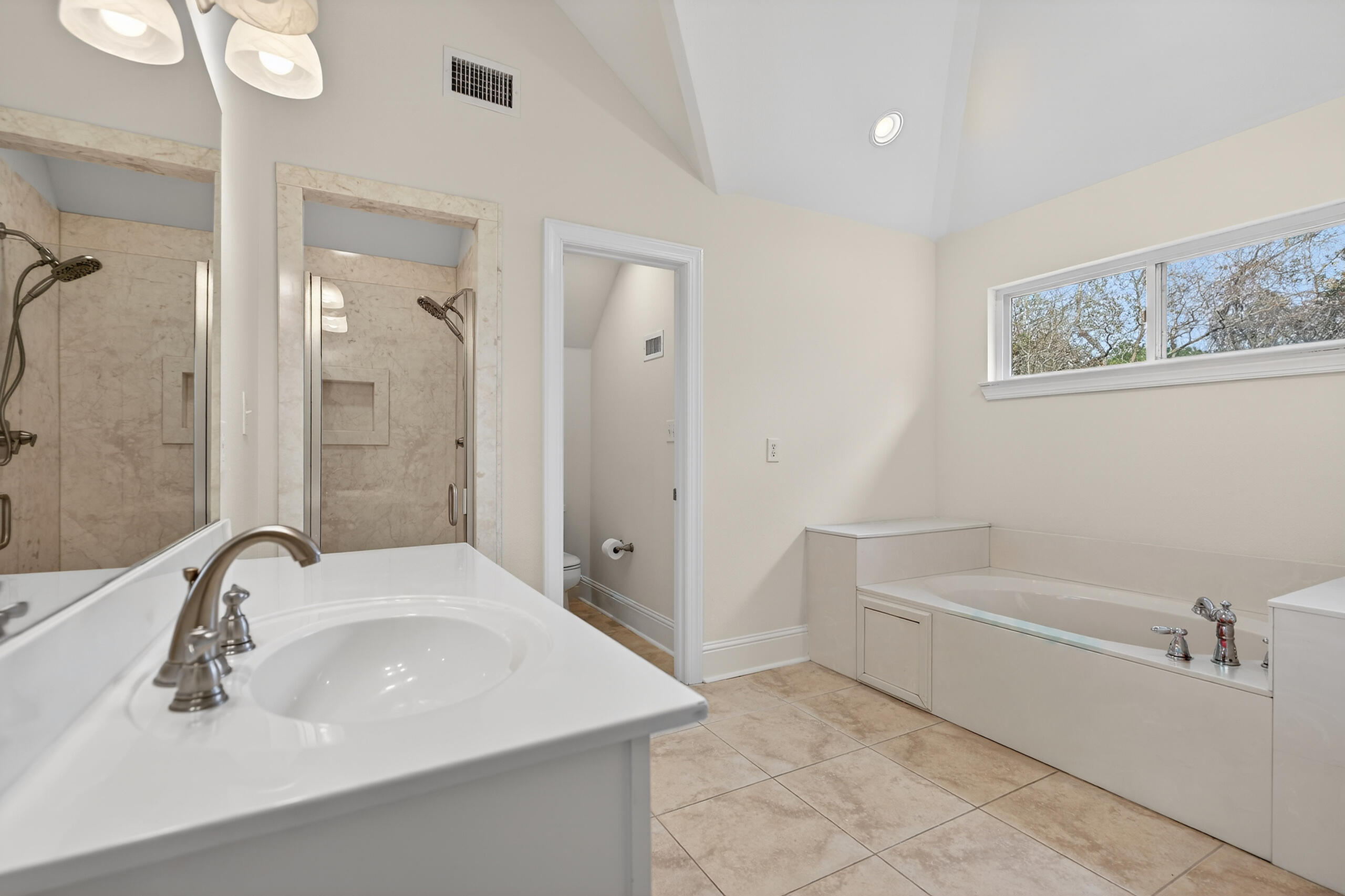 159 7th Street Santa Rosa Beach, FL 32459 - Photo 41 of 53 a bathroom with a bathtub and a sink