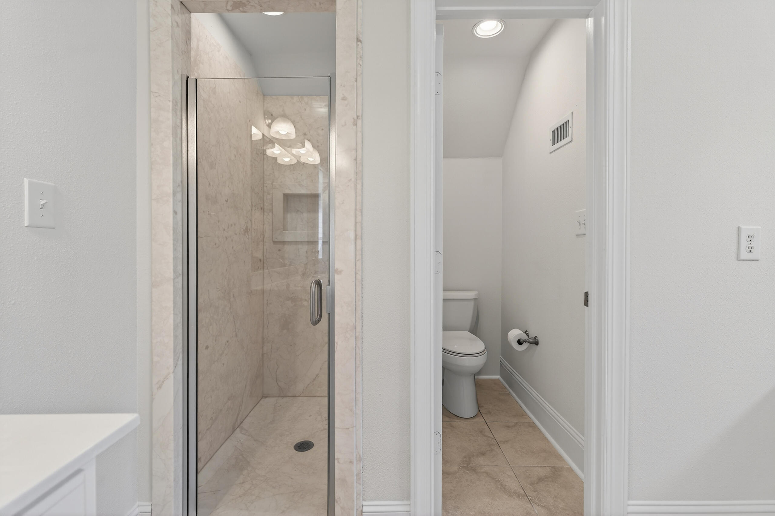 159 7th Street Santa Rosa Beach, FL 32459 - Photo 44 of 53 a bathroom that has a glass shower door