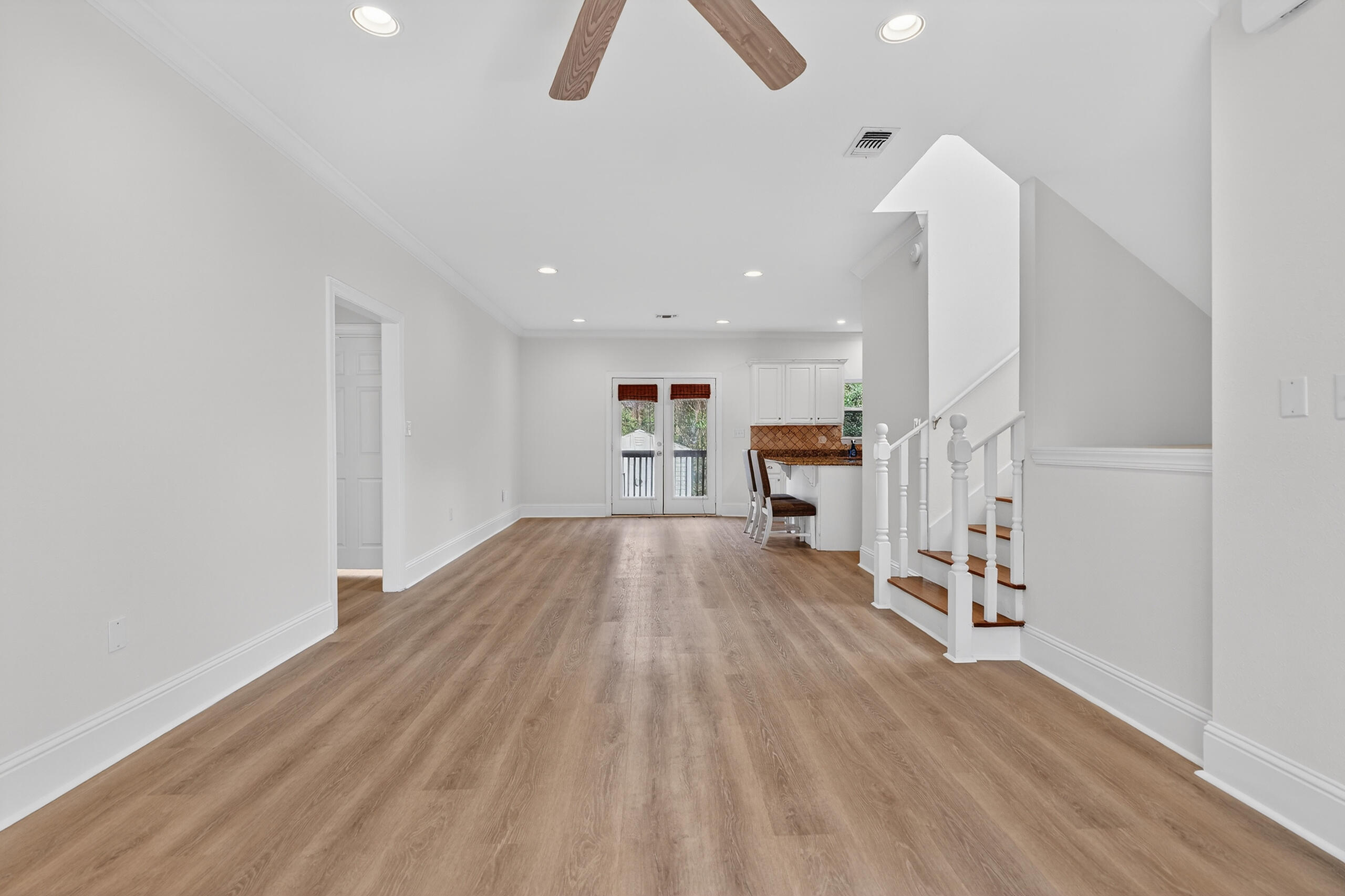 159 7th Street Santa Rosa Beach, FL 32459 - Photo 5 of 53 a view of empty room with wooden floor