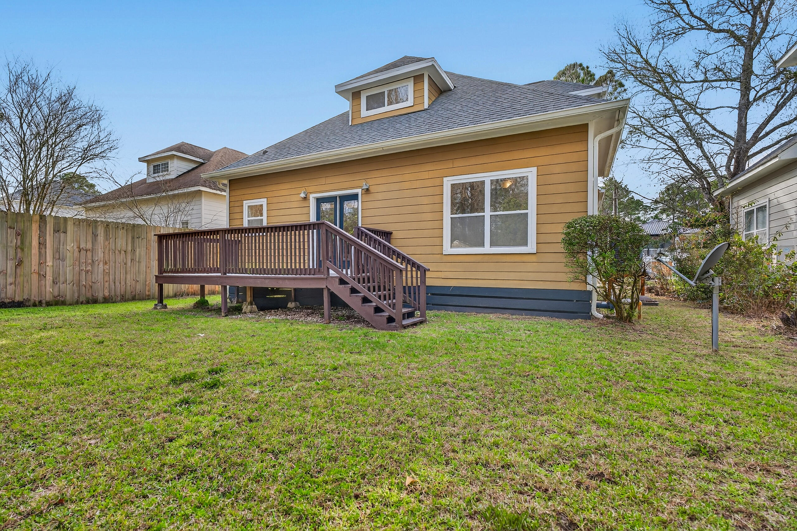 159 7th Street Santa Rosa Beach, FL 32459 - Photo 53 of 53 a front view of a house with a yard