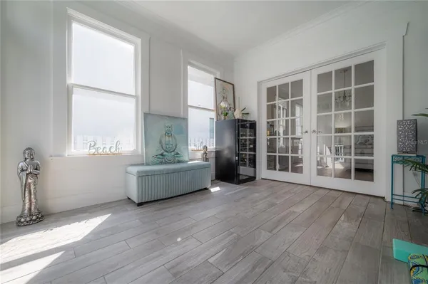 a living room with furniture and a window