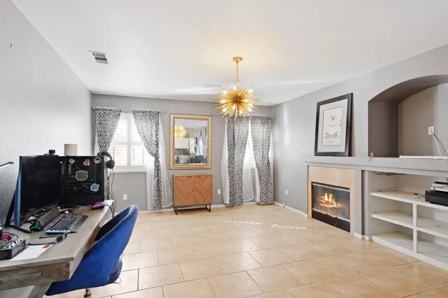 a workspace with furniture and window