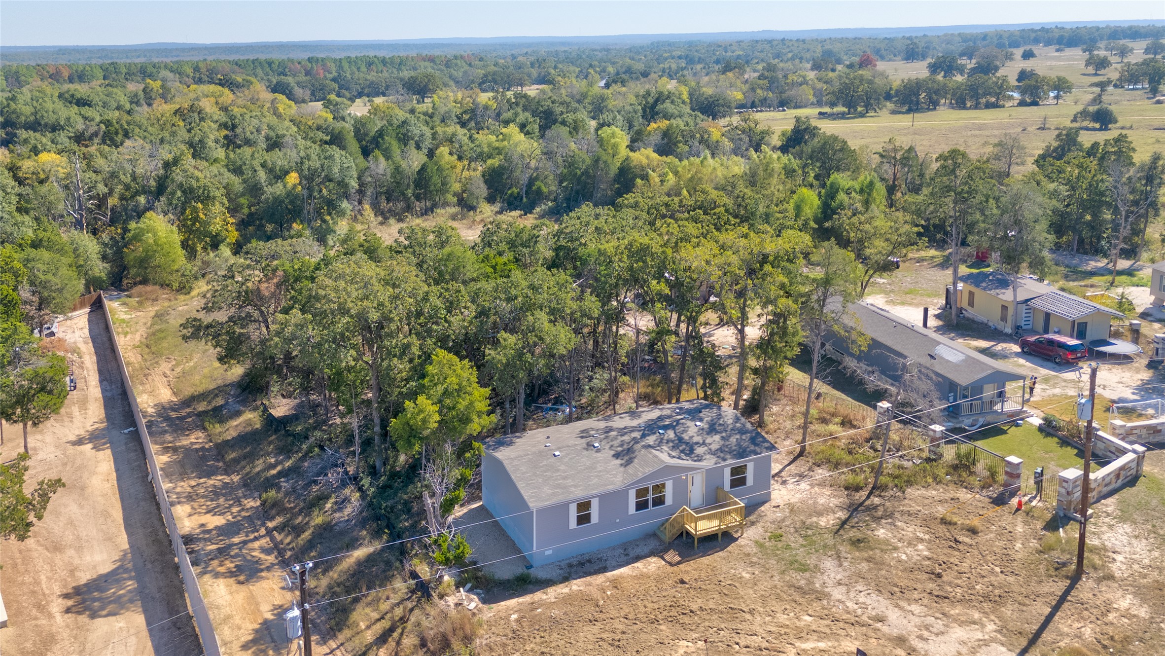 107 Los Cueva Road Elgin, TX 78621 - Photo 2 of 31 Aerial view of property and surrounding area