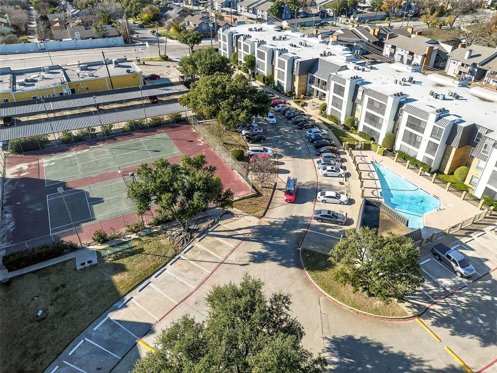 11460 Audelia Road, Unit 287 Dallas, TX 75243 - Photo 37 of 39 Drone / aerial view of one community pool and sports court pool
