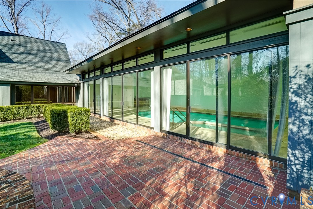 503 Welwyn Road Henrico, VA 23229 - Photo 4 of 37 Brick patio off the indoor pool