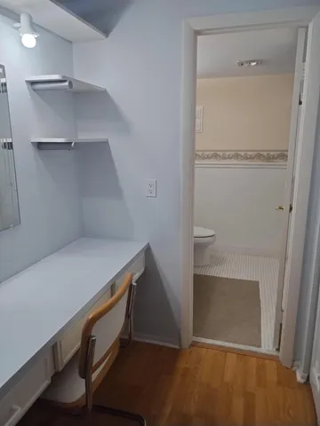 a view of an empty walk in closet