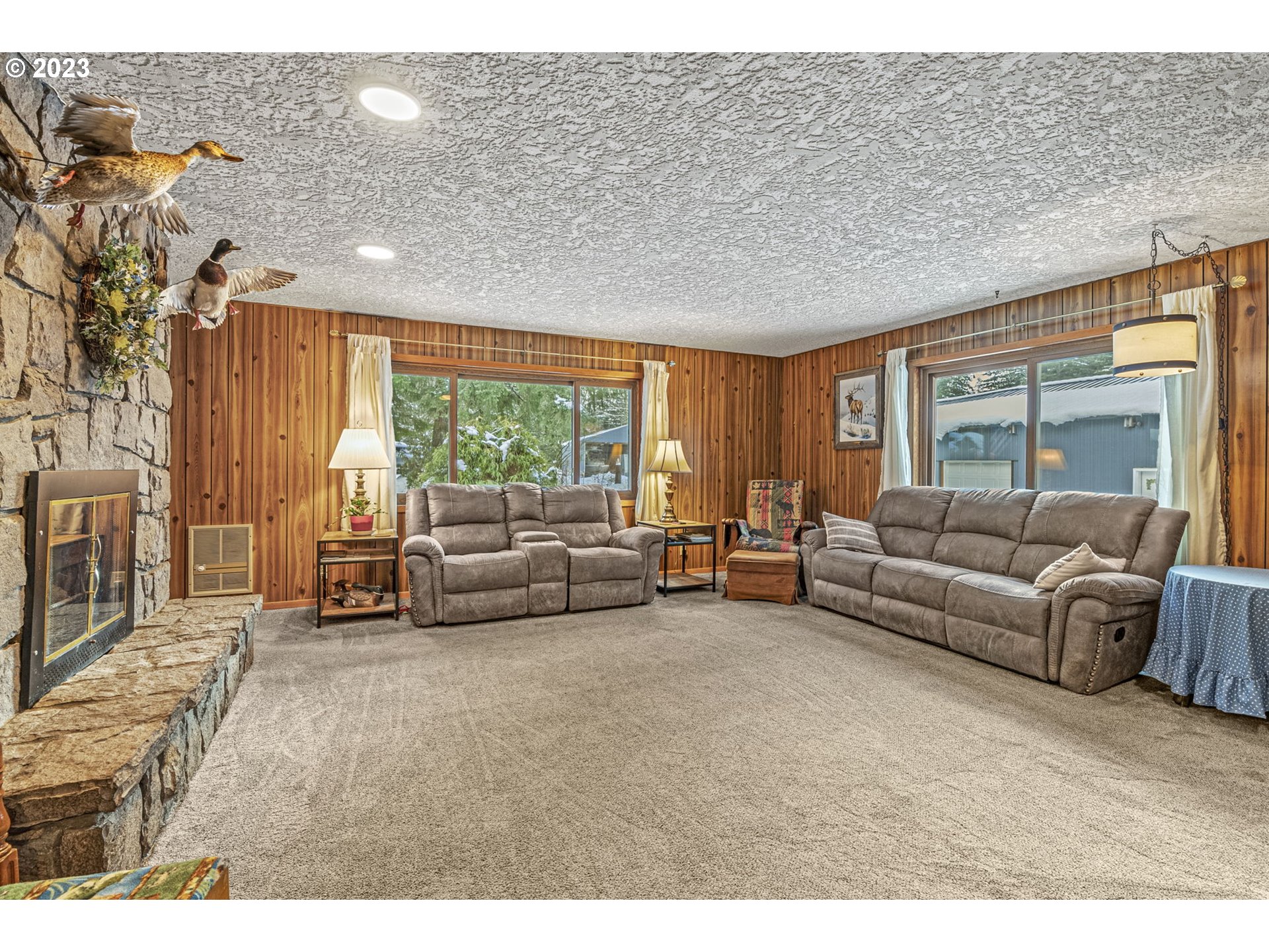 71 Stevens Road Washougal, WA 98671 - Photo 15 of 32 a living room with furniture and a large window