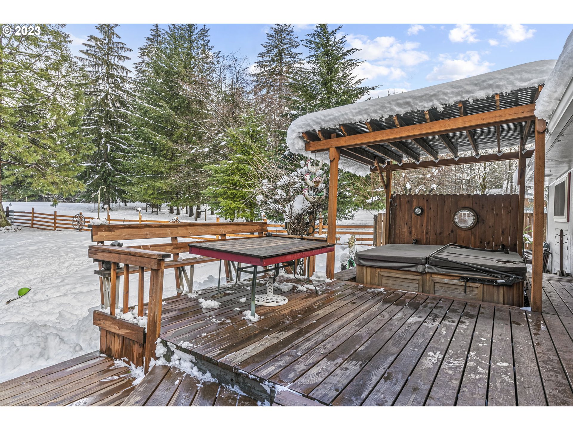71 Stevens Road Washougal, WA 98671 - Photo 24 of 32 a view of a patio with wooden floor and outdoor seating