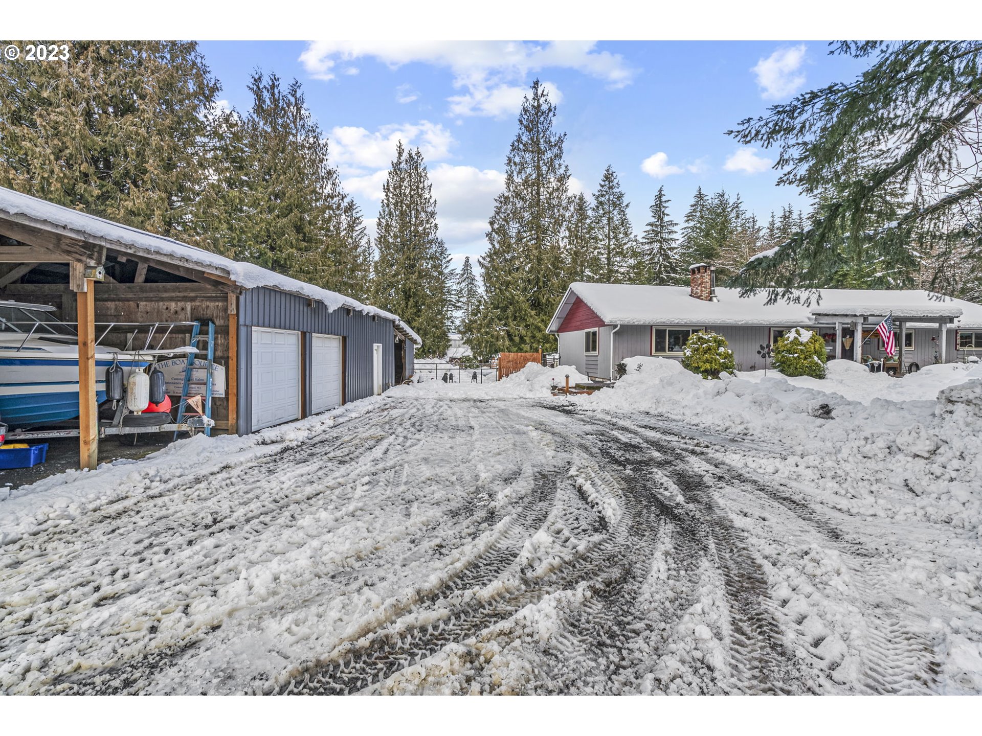 71 Stevens Road Washougal, WA 98671 - Photo 31 of 32 a view of a house with a backyard and trees
