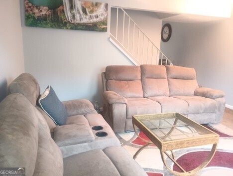 3168 Nectarine Circle Decatur, GA 30034 - Photo 2 of 9 a living room with furniture and a painting on the wall