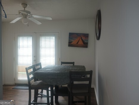 3168 Nectarine Circle Decatur, GA 30034 - Photo 5 of 9 a view of a dining room with furniture and wooden floor