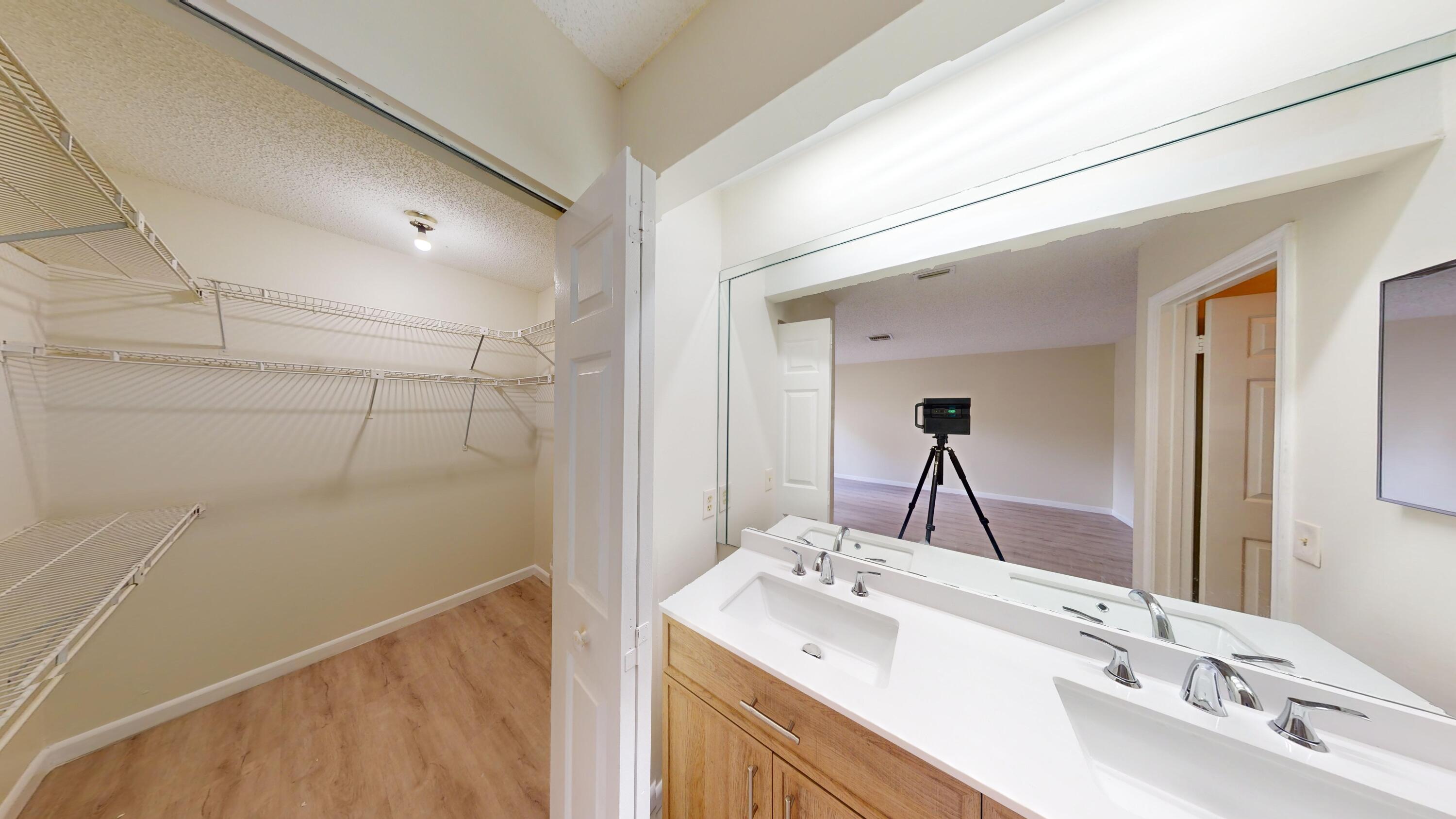 3149 Kingswood Terrace Boca Raton, FL 33431 - Photo 15 of 16 a bathroom with a sink and a mirror