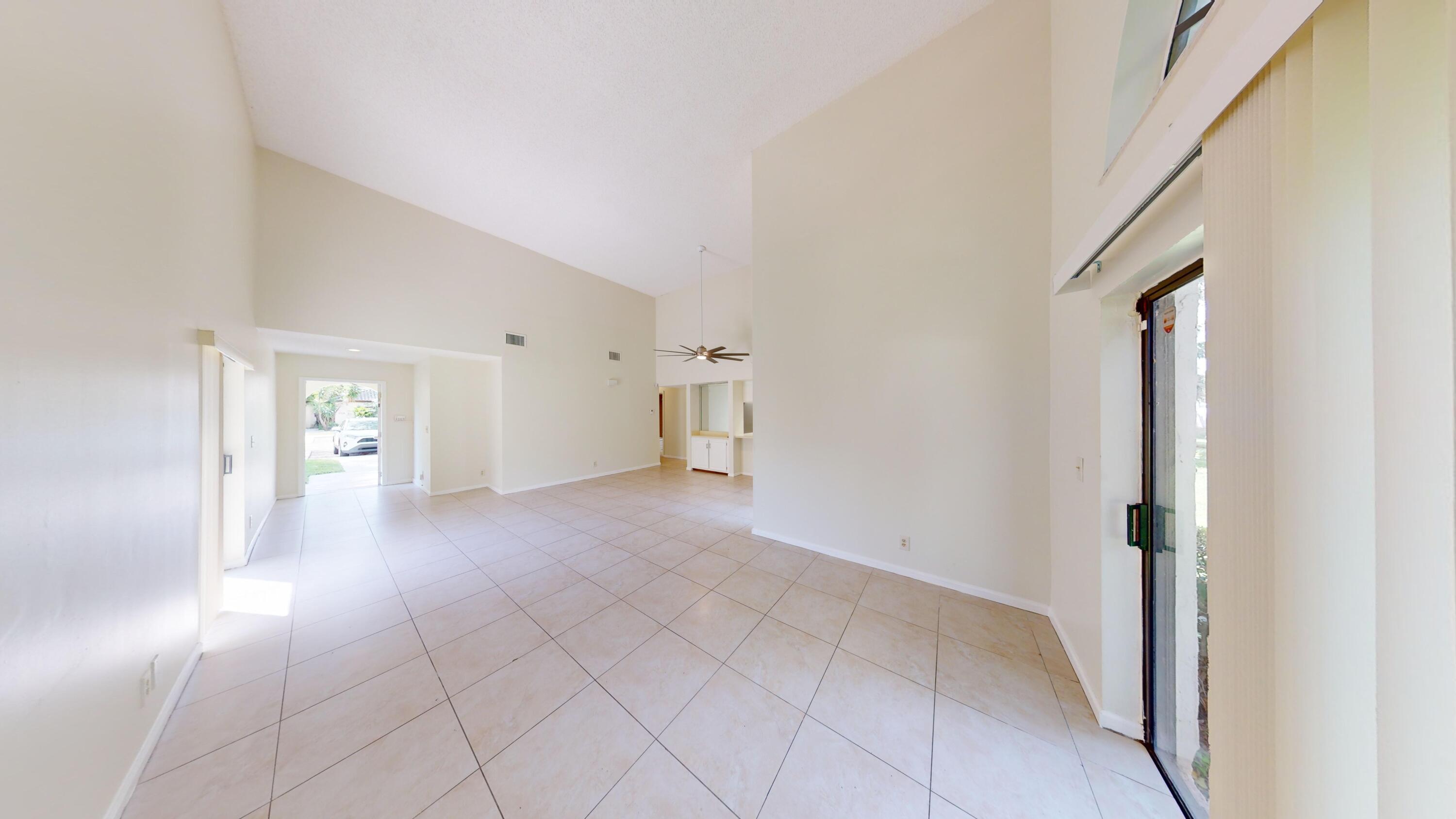 3149 Kingswood Terrace Boca Raton, FL 33431 - Photo 3 of 16 a view of a hallway with closet and entryway