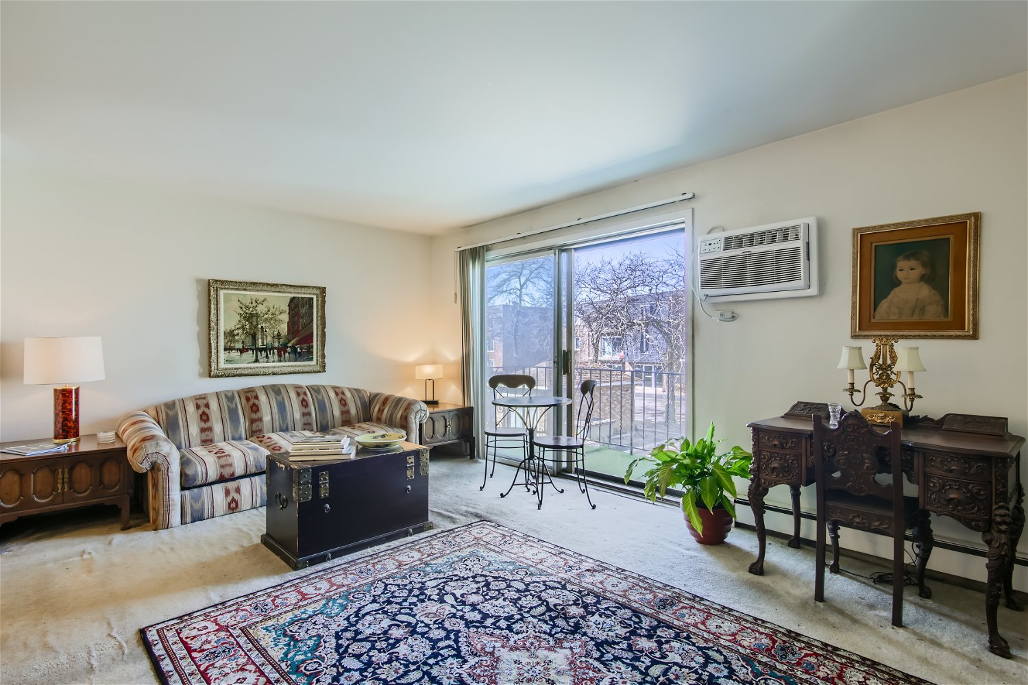10820 Kilpatrick Avenue, Unit 2SW Oak Lawn, IL 60453 - Photo 2 of 11 a living room with furniture and a window