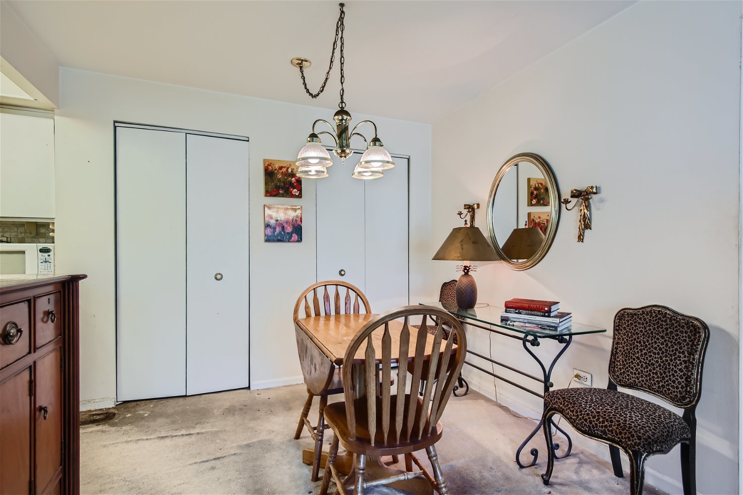 10820 Kilpatrick Avenue, Unit 2SW Oak Lawn, IL 60453 - Photo 4 of 11 a view of a dining room with furniture a chandelier and wooden floor