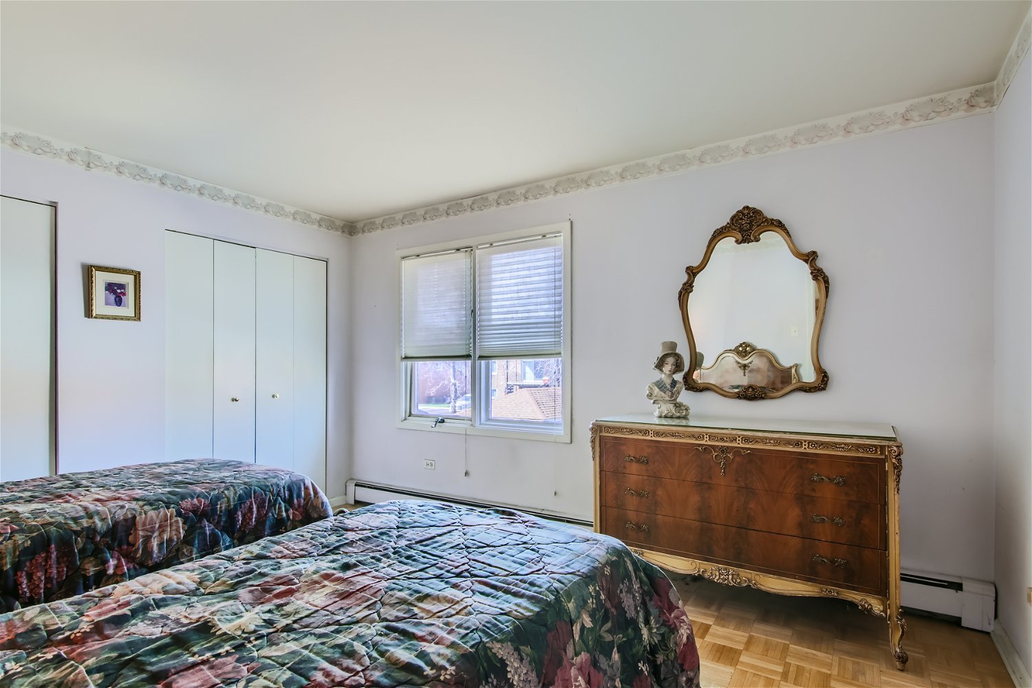 10820 Kilpatrick Avenue, Unit 2SW Oak Lawn, IL 60453 - Photo 7 of 11 a bedroom with a bed and a dresser