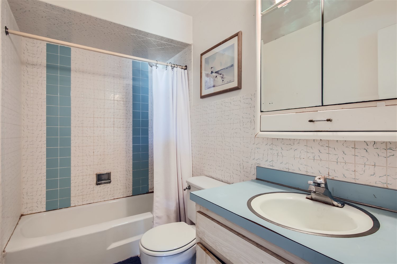 10820 Kilpatrick Avenue, Unit 2SW Oak Lawn, IL 60453 - Photo 10 of 11 a bathroom with a granite countertop sink toilet a mirror and shower