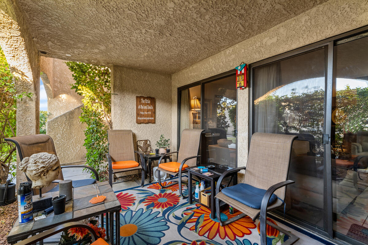 200 East Racquet Club Road, Unit 69 Palm Springs, CA 92262 - Photo 24 of 44 a living room filled with furniture