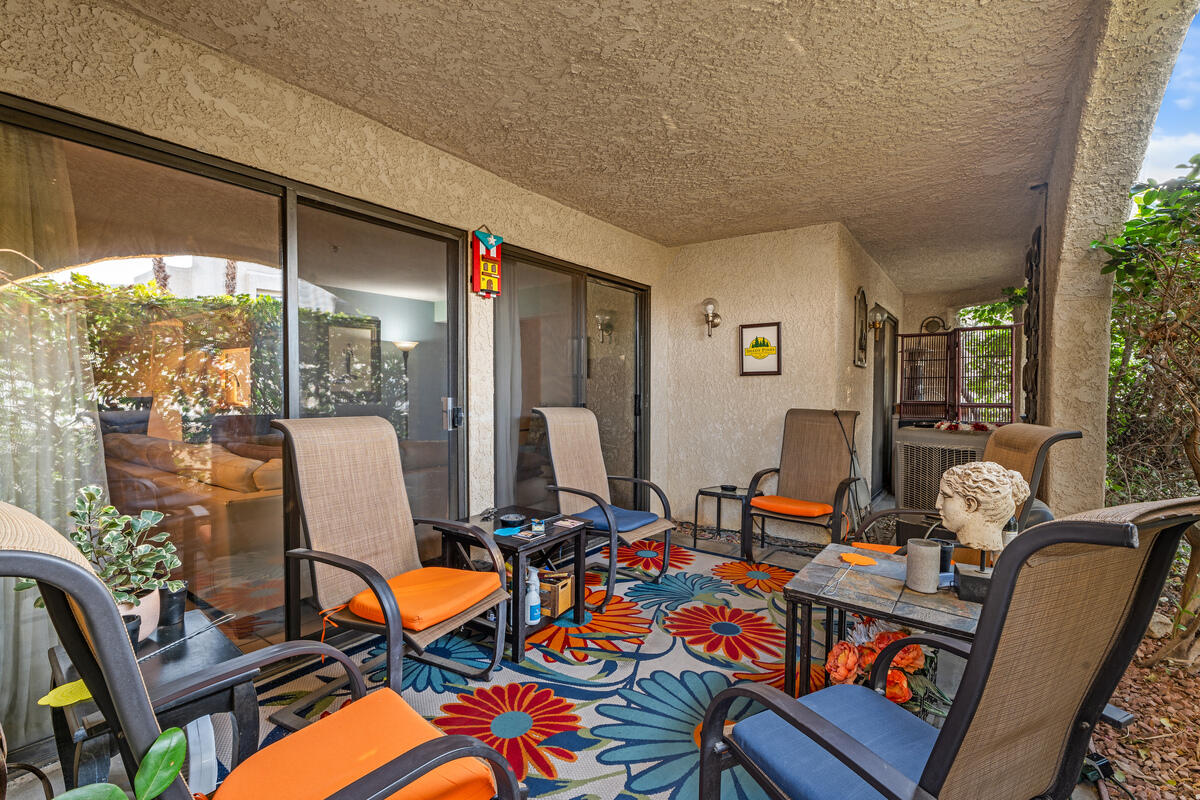 200 East Racquet Club Road, Unit 69 Palm Springs, CA 92262 - Photo 26 of 44 a room with lots of furniture and equipment