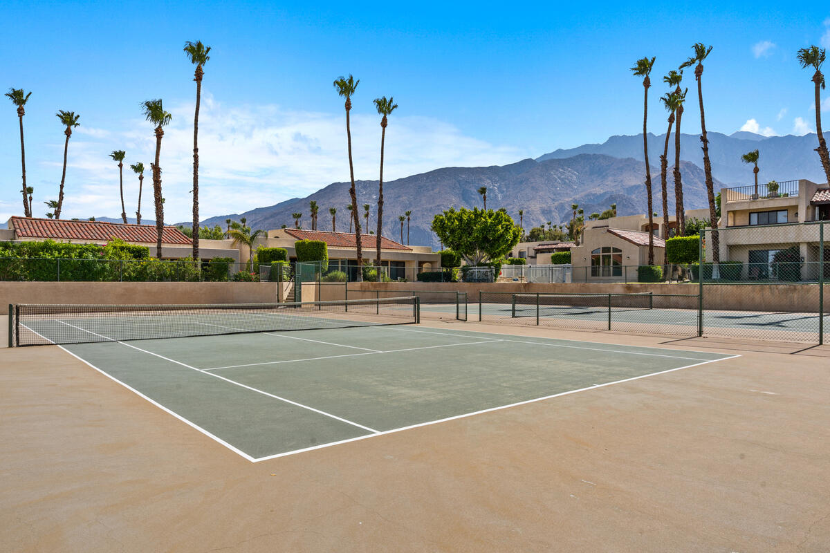 200 East Racquet Club Road, Unit 69 Palm Springs, CA 92262 - Photo 28 of 44 a view of a tennis court