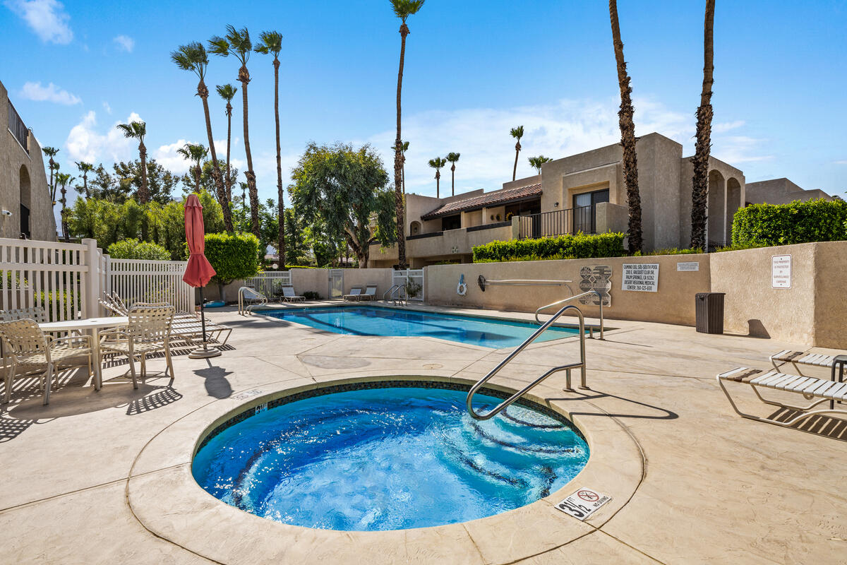 200 East Racquet Club Road, Unit 69 Palm Springs, CA 92262 - Photo 33 of 44 a view of a house with swimming pool