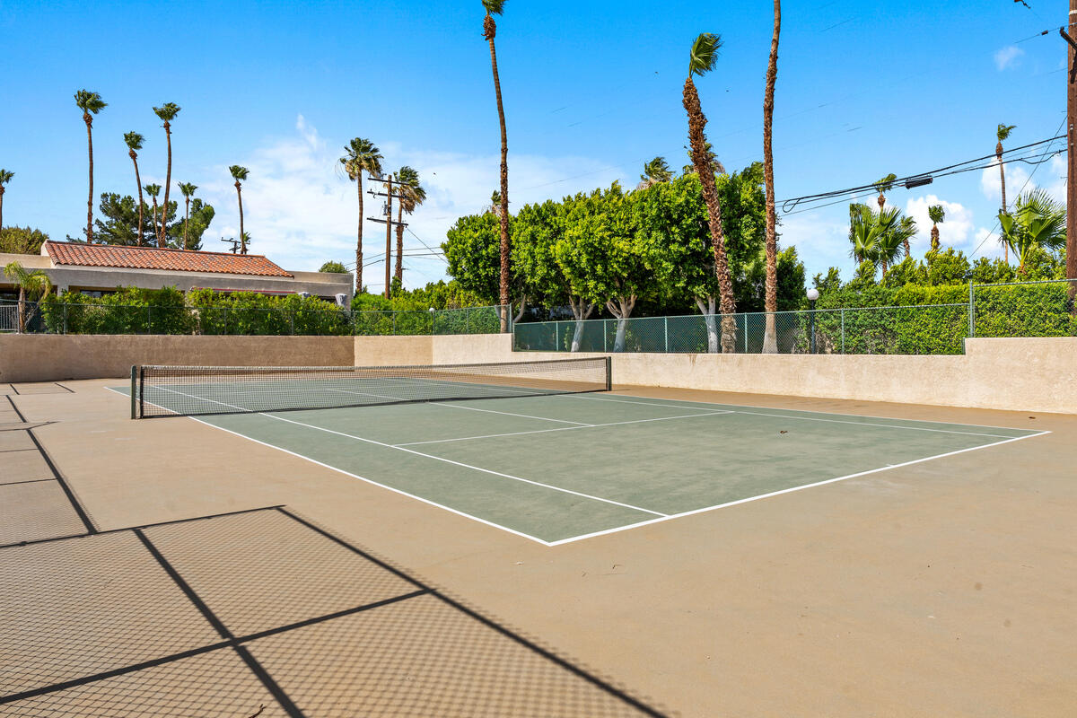200 East Racquet Club Road, Unit 69 Palm Springs, CA 92262 - Photo 41 of 44 a view of a tennis court