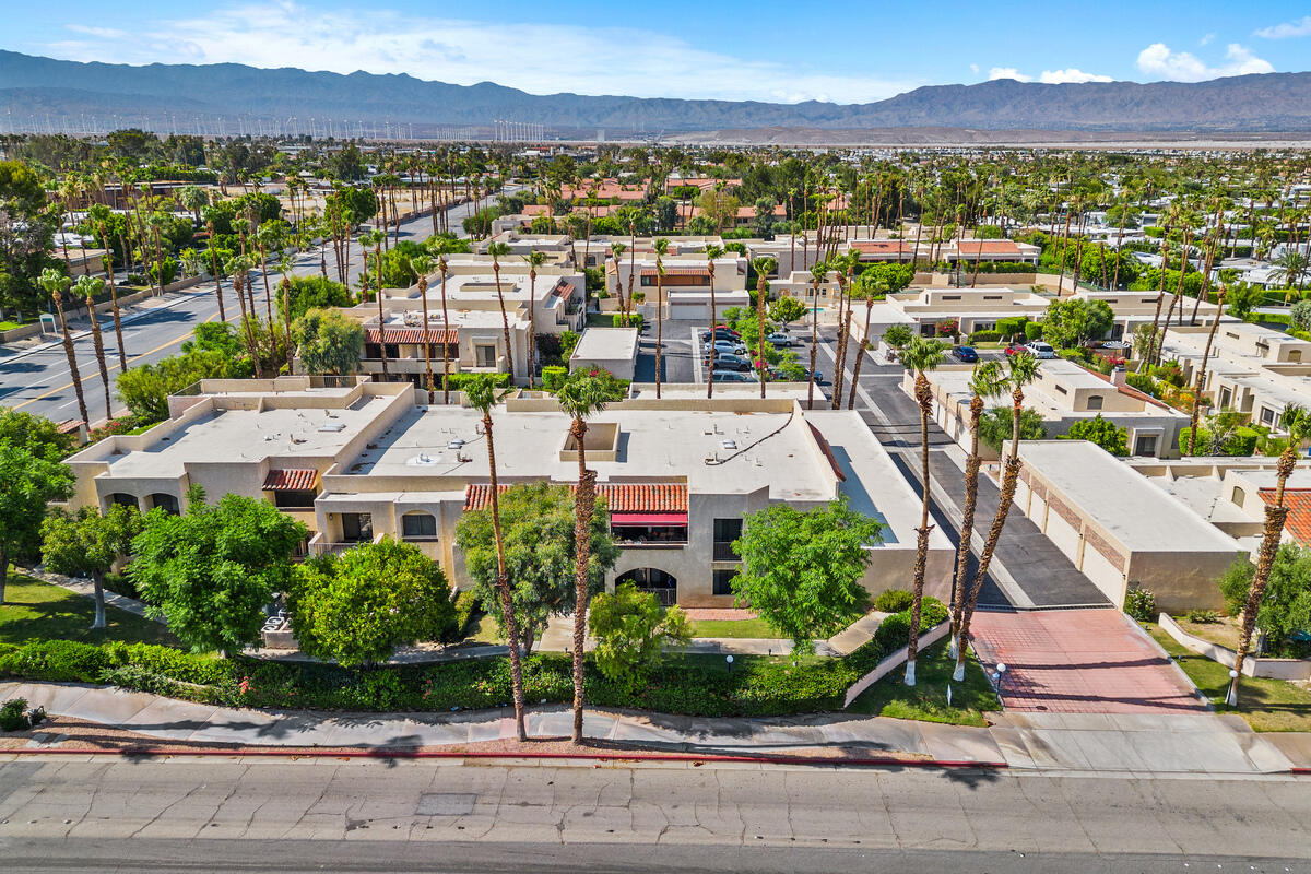 200 East Racquet Club Road, Unit 69 Palm Springs, CA 92262 - Photo 43 of 44 an aerial view of residential houses and outdoor space